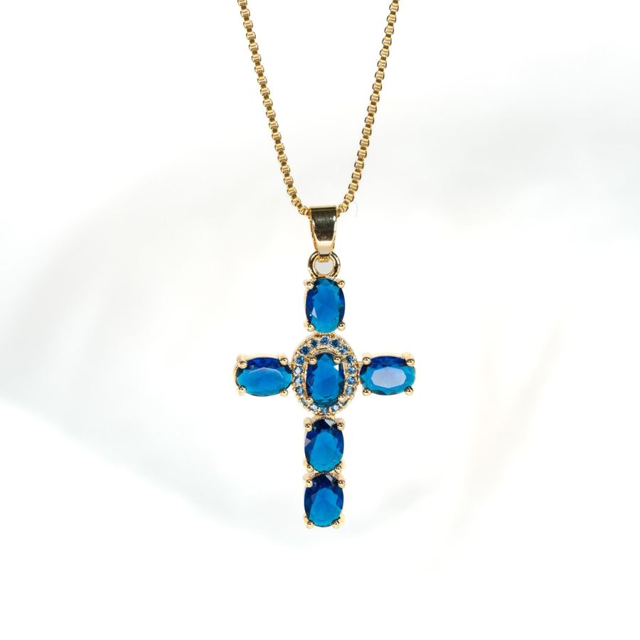 Collier croix cristal bleue plaquée or